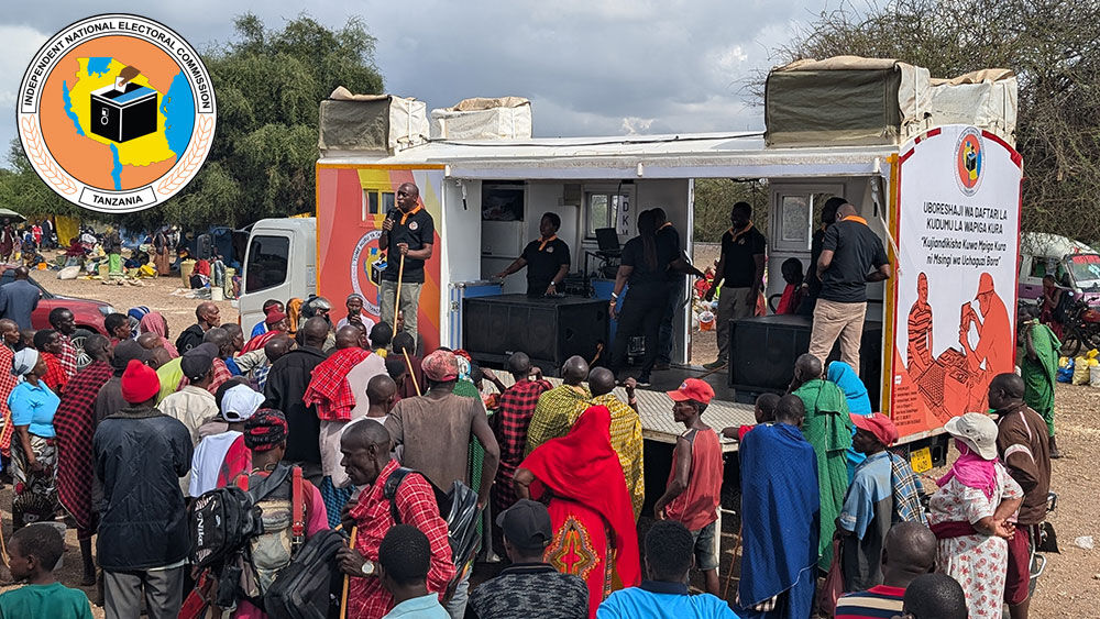 An officer of the Independent National Electoral Commission providing voter education in the Arusha Region.